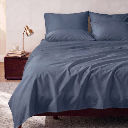 Lane Linen Organic Cotton Sheet Set in Estate Blue - styled on a bed