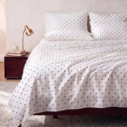 Lane Linen Organic Cotton Sheet Set in Polka Dot Black - styled on a bed