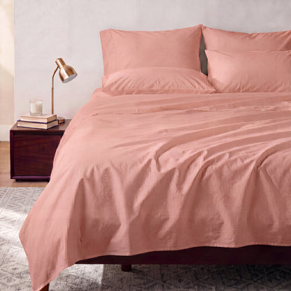 Lane Linen Organic Cotton Sheet Set in Rose Dawn - styled on a bed