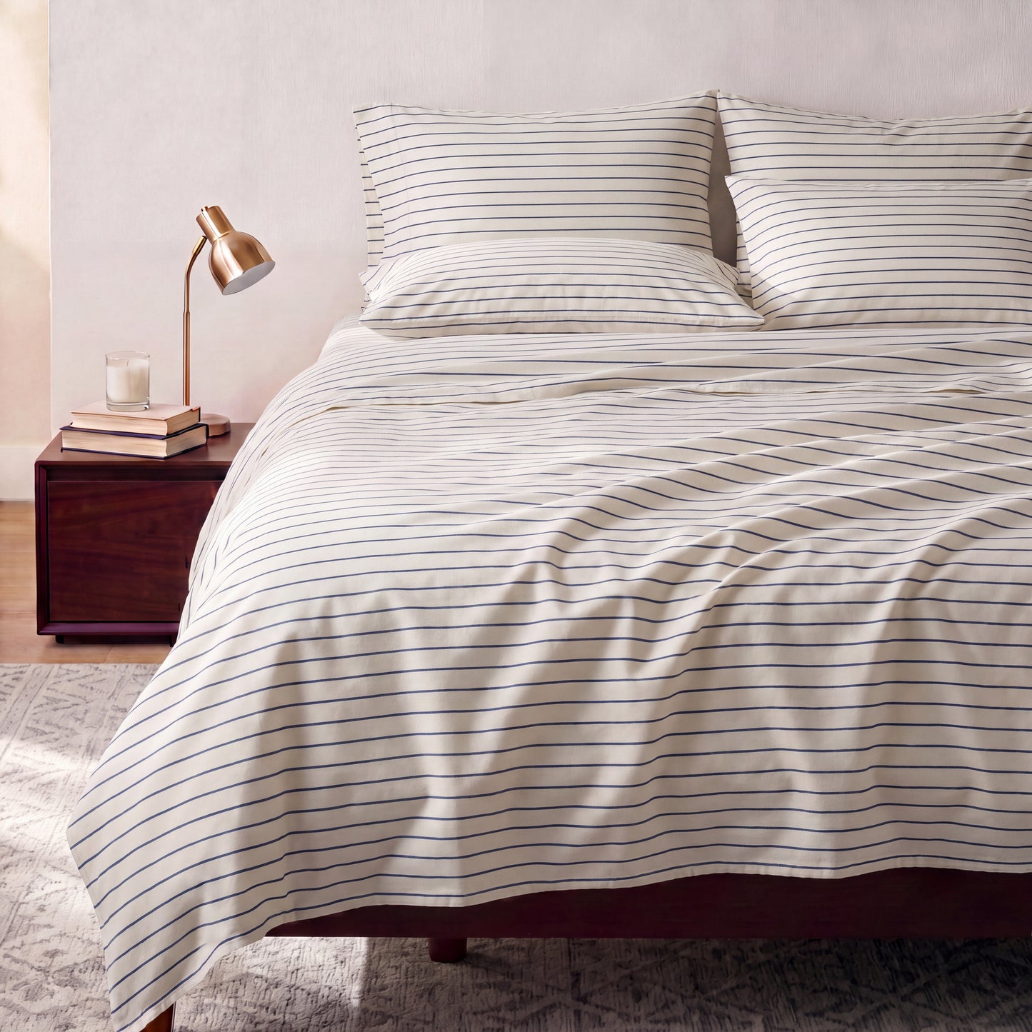 Lane Linen Organic Cotton Sheet Set in Ticking Stripe Cobalt Blue - styled on a bed
