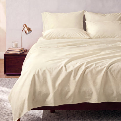 Lane Linen Organic Cotton Sheet Set in Vanilla - styled on a bed