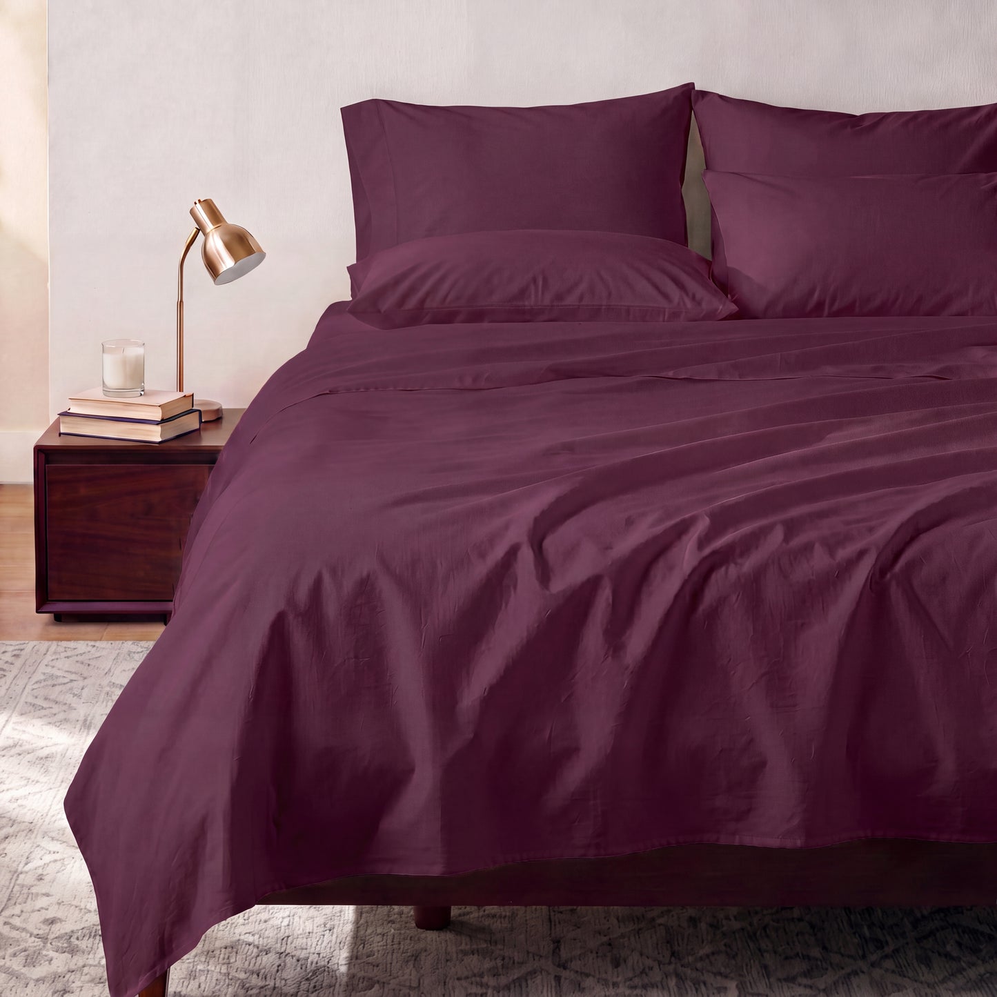 Lane Linen Organic Cotton Sheet Set in Windsor Wine - styled on a bed